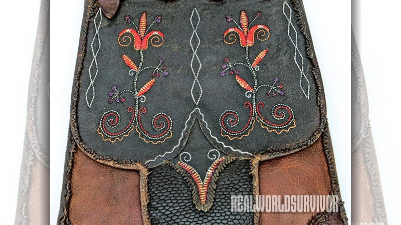 Shawn Webster made a quill-embroidered panel of brain- tanned buckskin hunting bag.