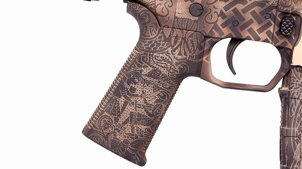 Don’t forget about the pistol grip. Odin’s Workshop’s continuation of the art from the receiver to the grip is seamless!