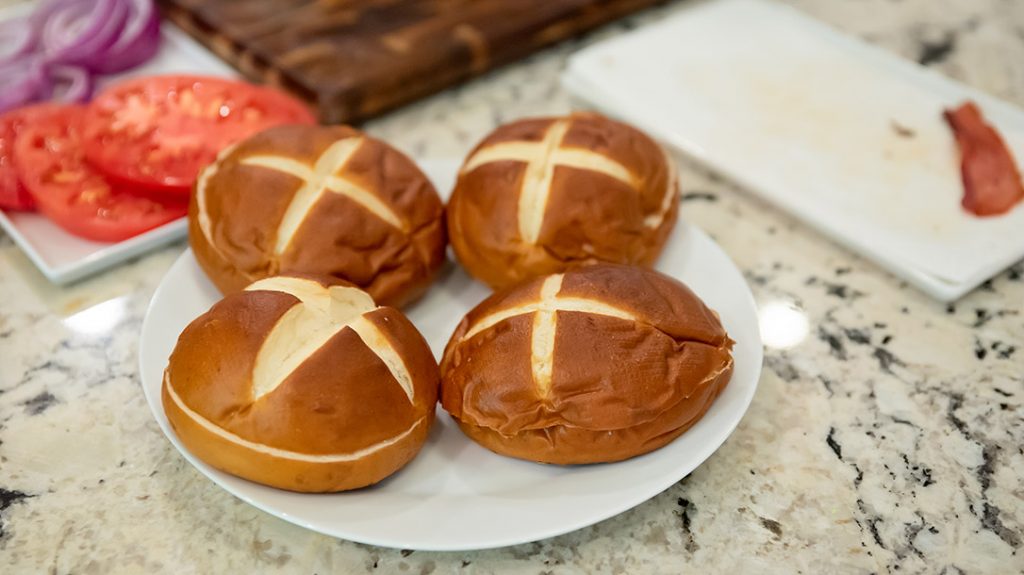 Prepare your pretzel buns to receive the burgers.