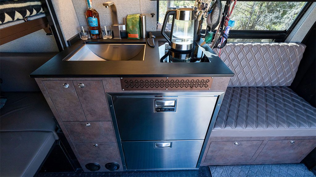 The custom galley kitchen of the Outside Van Launch Pad is the perfect size for whipping up a quick meal.