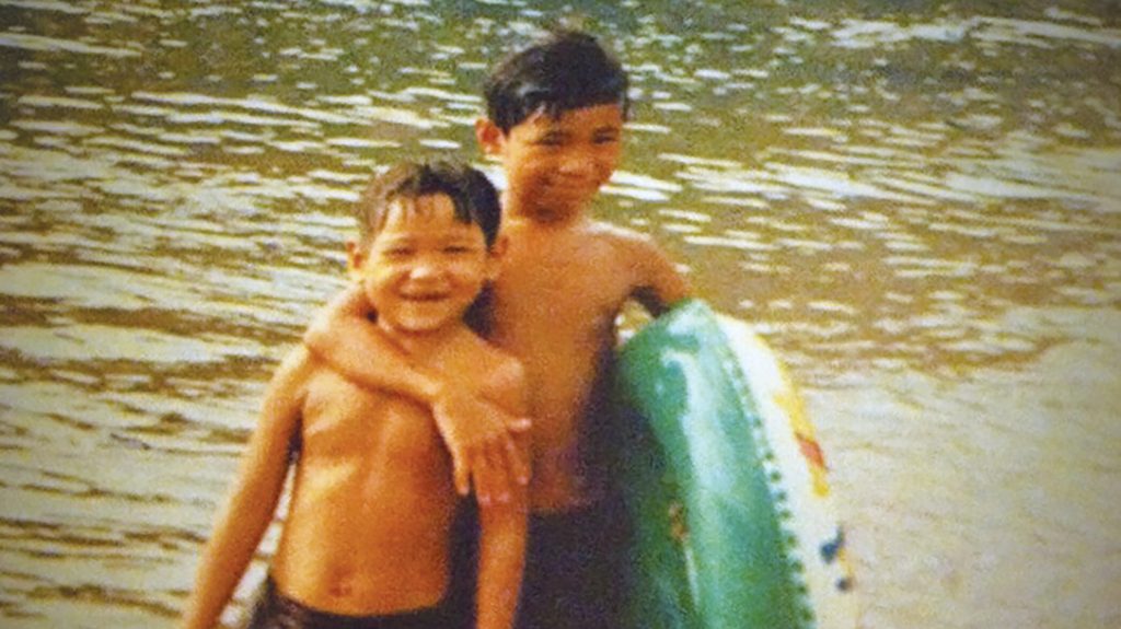 Tu Lam with his older brother.