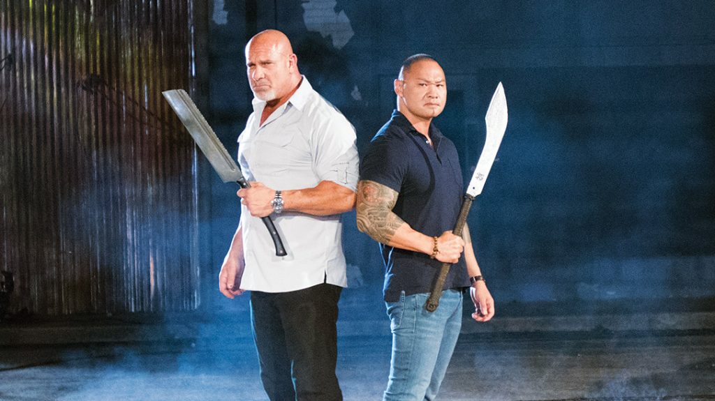 Tu Lam and Bill Goldberg on the set of their show Forged in Fire: Knife or Death.