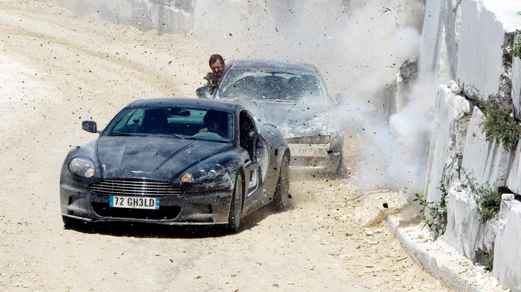 Would James Bond win in a car chase vs John Wick?