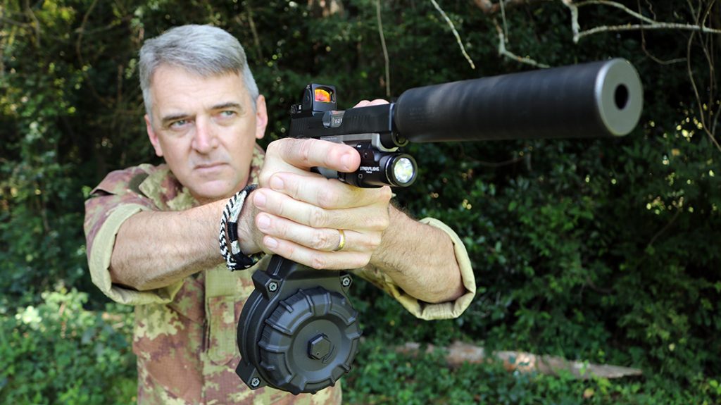 The author shooting his SIG P365 XL spy gun build.