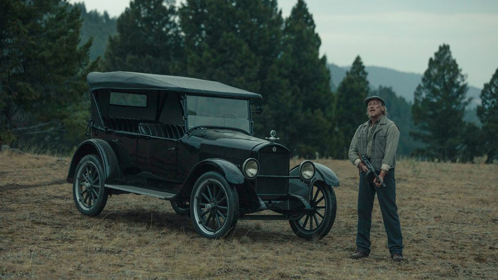 Jerome Flynn as Banner Creighton in 1923 – he is seen driving a Studebaker Big Six, while he is armed with a Thompsons M1921 submachine gun 