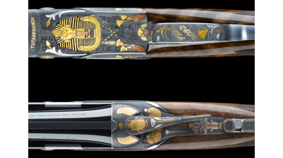The top and bottom of the shotgun feature several pictures inspired from scenes in King Tut's tomb. 